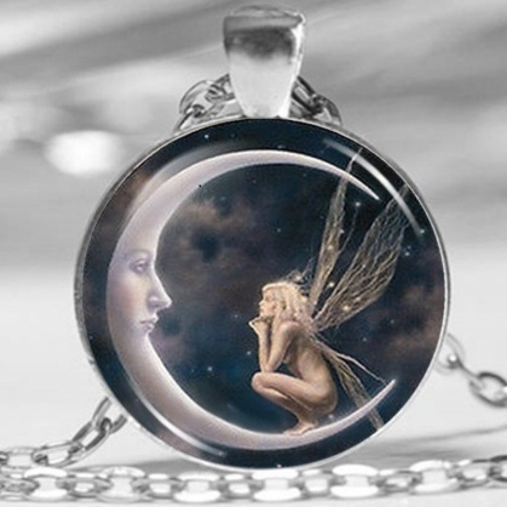 fairy on moon necklace NWOT (20 inch)